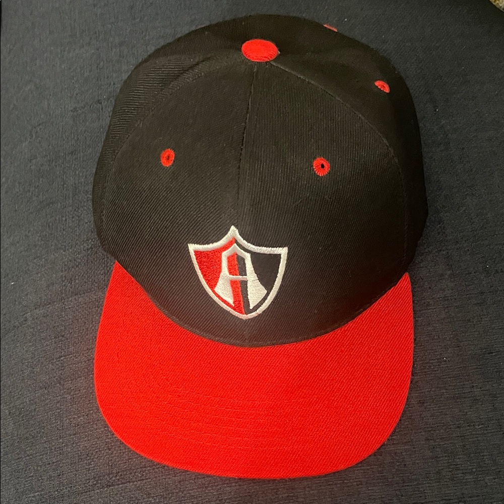 Black and Red Cap with Shield Logo